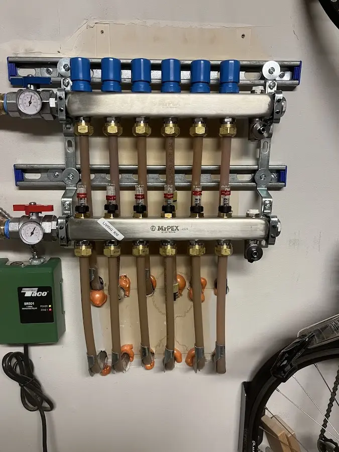 Plumber performing Water Heater Repair at a residential property in South Ogden